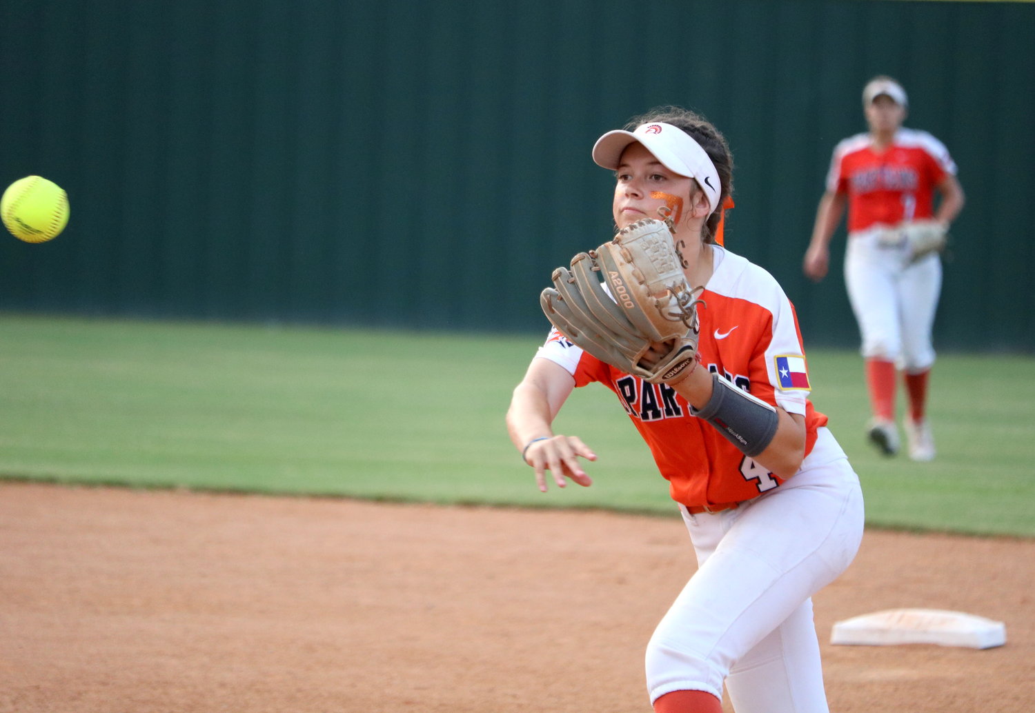 Haley Welch makes a throw to first base during Friday’s Class 6A Regional Semifinal between Seven Lakes and Deer Park at the Summer Creek softball field.
