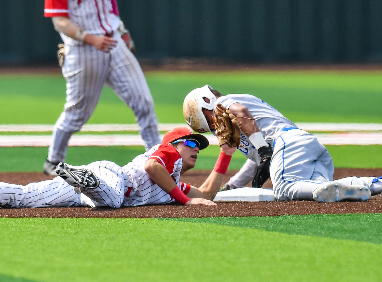 Katy Taylor's Joe Jefferson (5) dives into second base for a stolen base during the first inning in a Region III-6A quarterfinals baseball game at Langham Creek High School, Saturday, May 21, 2022.