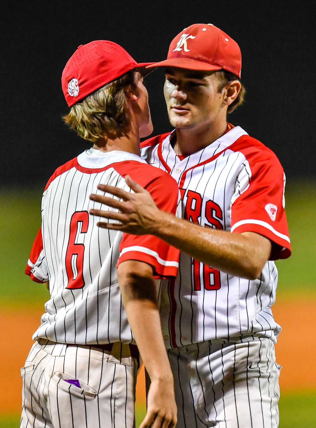 Katy's Brayden Powers (16) embraces with Katy's Josh Dunayczan (6) after getting out of the sixth inning with the game tied in a Region III-6A Regional SemiFinals baseball game between Katy and Strake Jesuit at Mayde Creek High School, Friday, May 27, 2022.