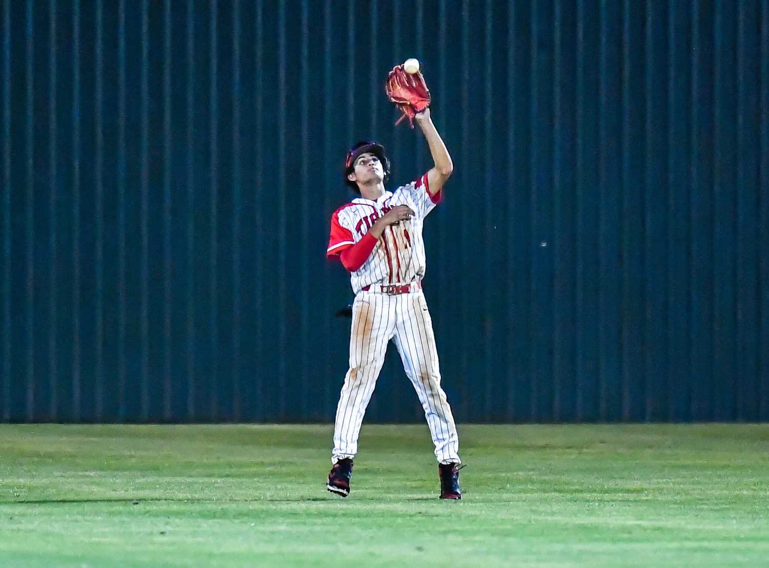 Katy's Dominic Melchor (11) makes the catch in center field  during the eight inning during a Region III-6A SemiFinals baseball game between Katy and Strake Jesuit at Mayde Creek High School, Friday, May 27, 2022.