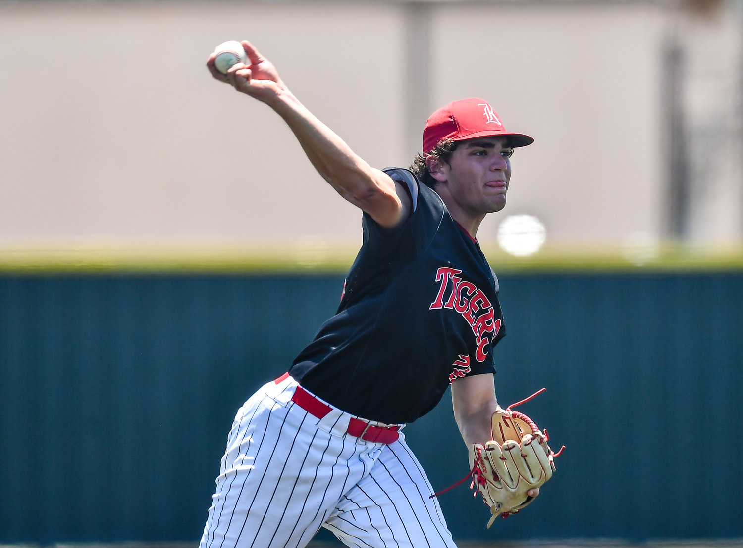 Katy's Cole Kaase (28) starting pitcher, throws to first in a pick off attempt during the second inning of game three during a Region III-6A Regional SemiFinals baseball game between Katy and Strake Jesuit at Jersey Village High School, Saturday, May 28, 2022..