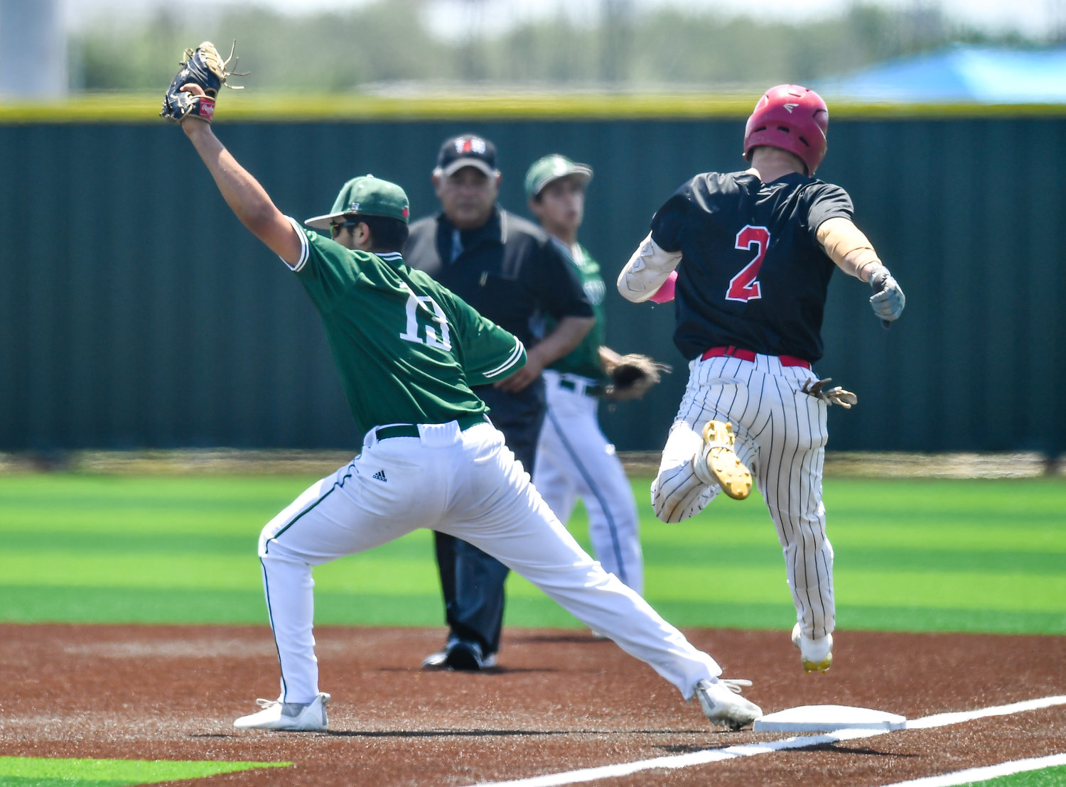 Katy's Parker Kidwell (2) is thrown out during the sixth inning of game three during a Region III-6A Regional SemiFinals baseball game between Katy and Strake Jesuit at Jersey Village High School, Saturday, May 28, 2022.