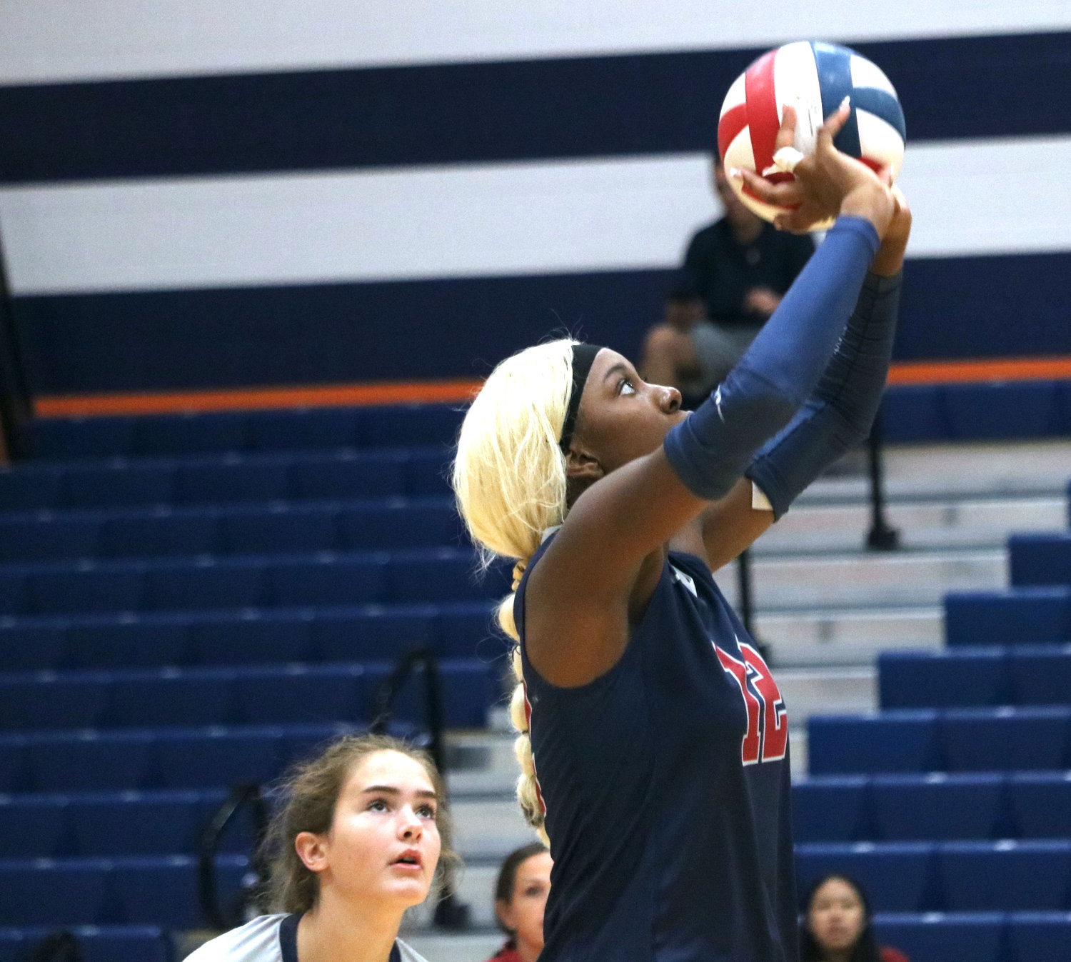 Tompkins’ Cindy Tchouangwa sets a ball against Canyon in the finals match of gold bracket Katy ISD/Cy-Fair Tournament at Bridgeland.