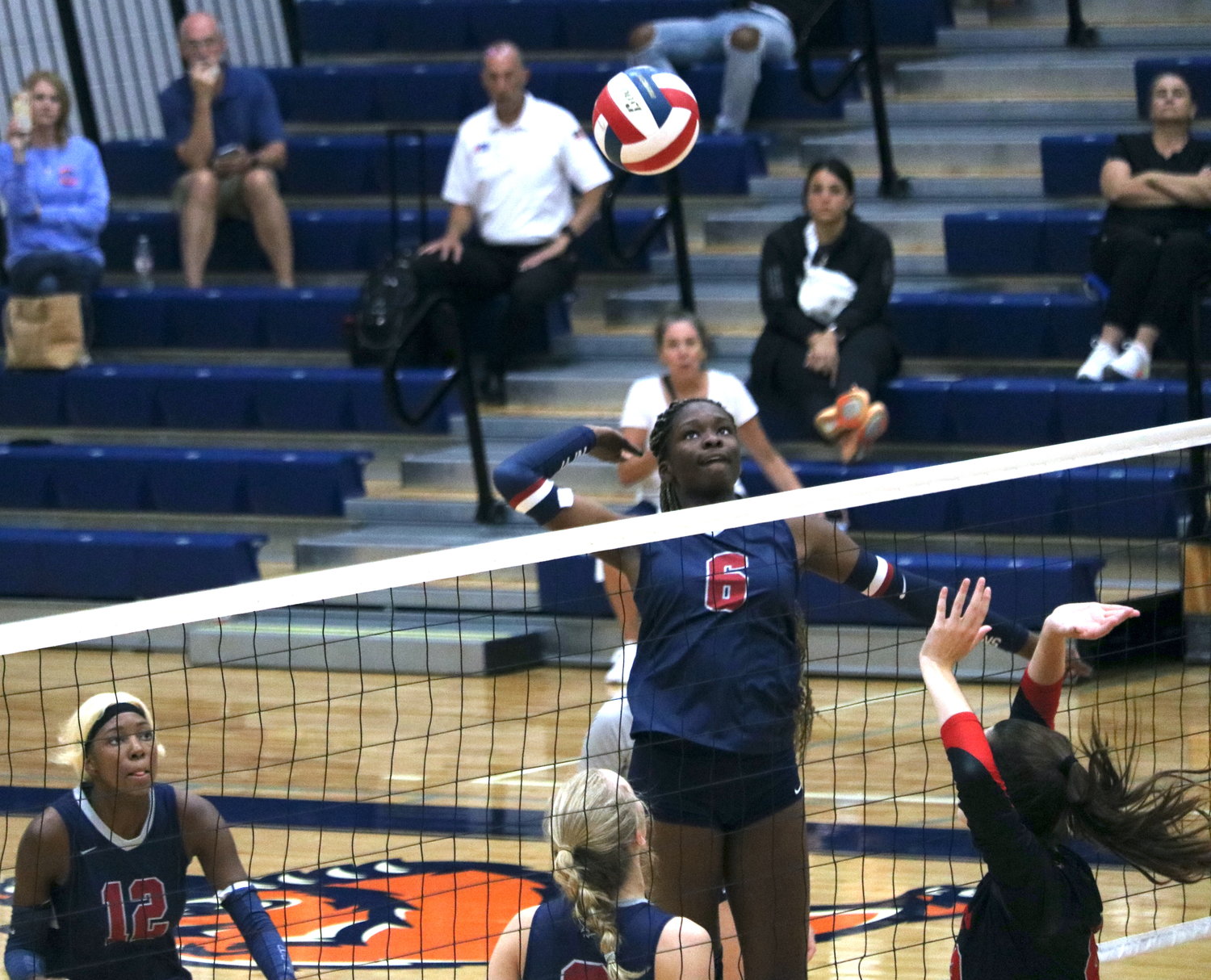 Tompkins’ Simi Elliott spikes a ball against Canyon in the finals match of gold bracket Katy ISD/Cy-Fair Tournament at Bridgeland.