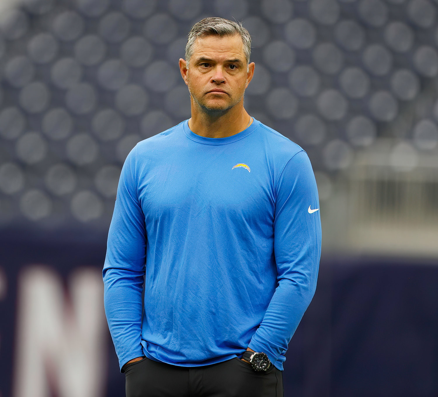 Los Angeles Chargers offensive coordinator Joe Lombardi on the field during warmups before an NFL game between the Texans and the Chargers on Oct. 2, 2022 in Houston.