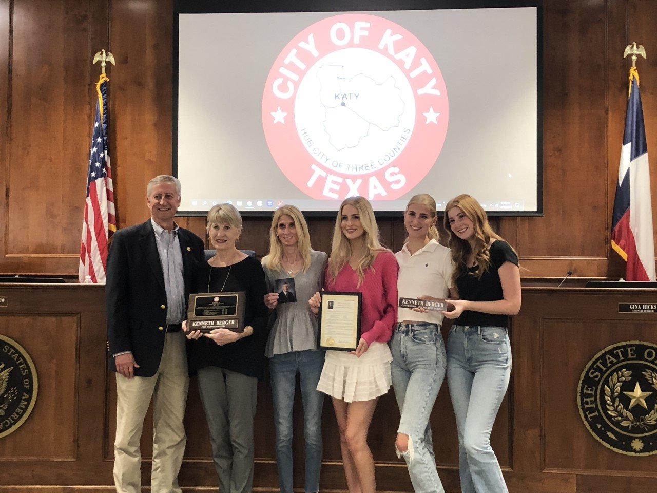 Mayor Dusty Thiele joined the Berger family Monday at City Hall to honor Kenneth Berger, who died Sept. 18. Berger served in a variety of municipal positions, including on the Katy City Council. Accepting the proclamation is his widow Debbie Berger, who is joined by daughter Shelly Royster, and granddaughters Katelyn, Hillary and Allyson Royster.
