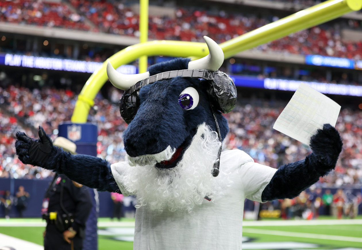 Houston Texans mascot Toro, dressed as Texans head coach Lovie Smith, during an NFL game between the Texans and the Titans on Oct. 30, 2022 in Houston.