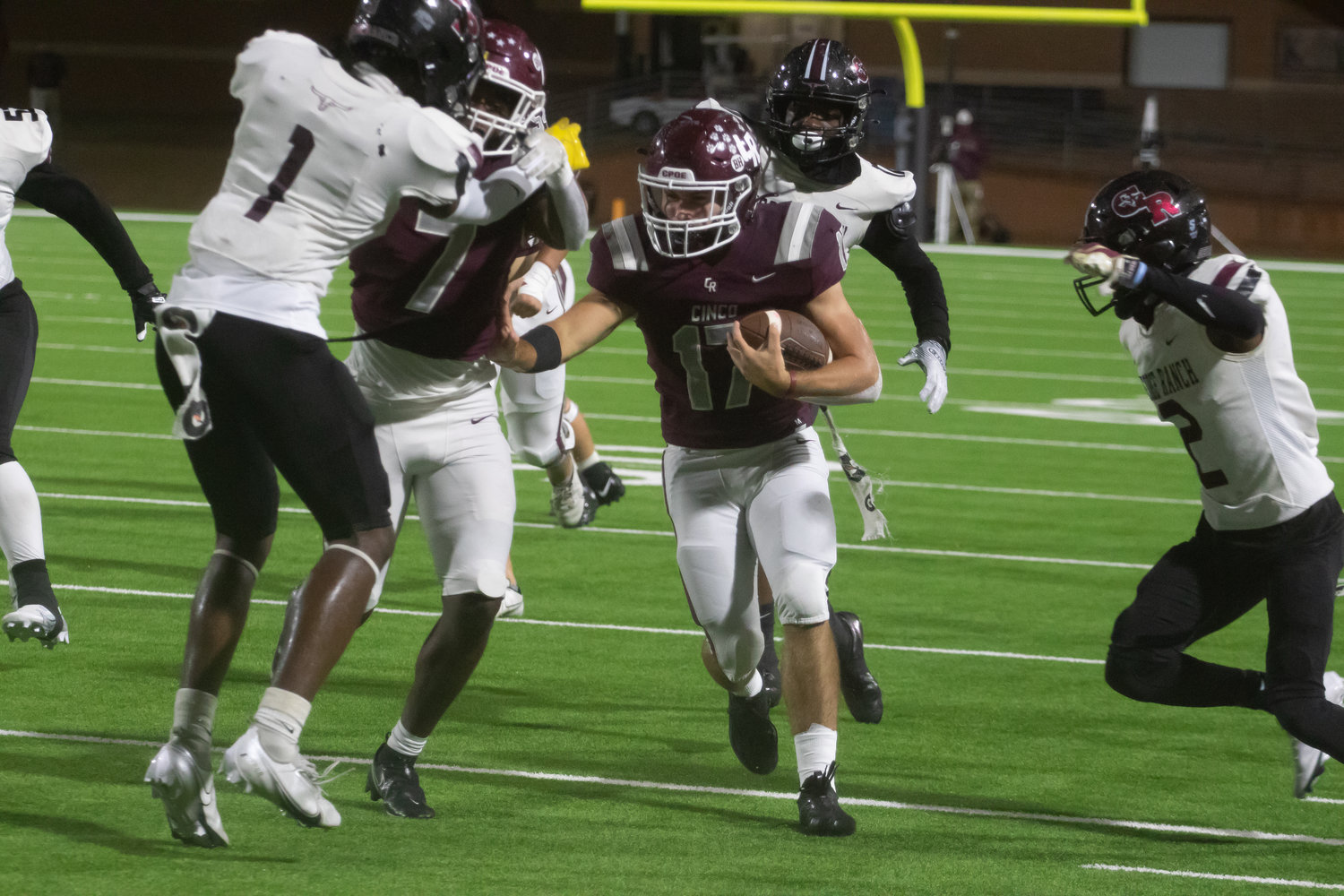 Eric Eckstrom rushes the ball during Friday's game between Cinco Ranch and George Ranch at Rhodes Stadium.