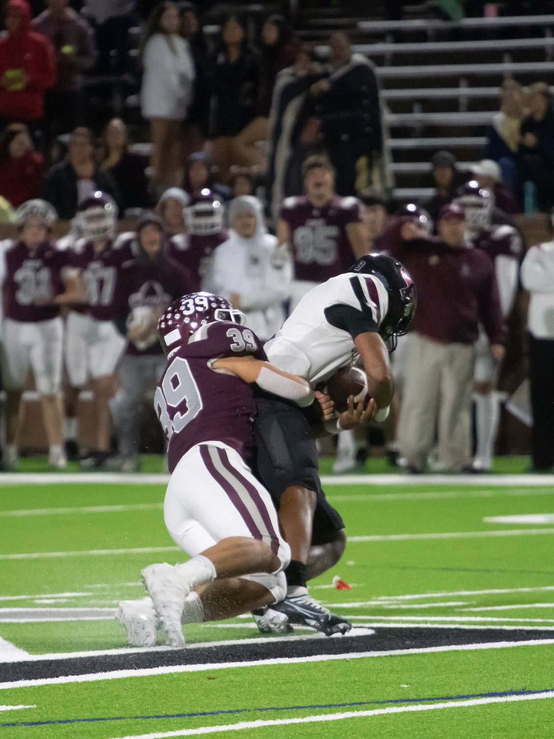 Braden Williams makes a sack during Friday's game between Cinco Ranch and George Ranch at Rhodes Stadium.