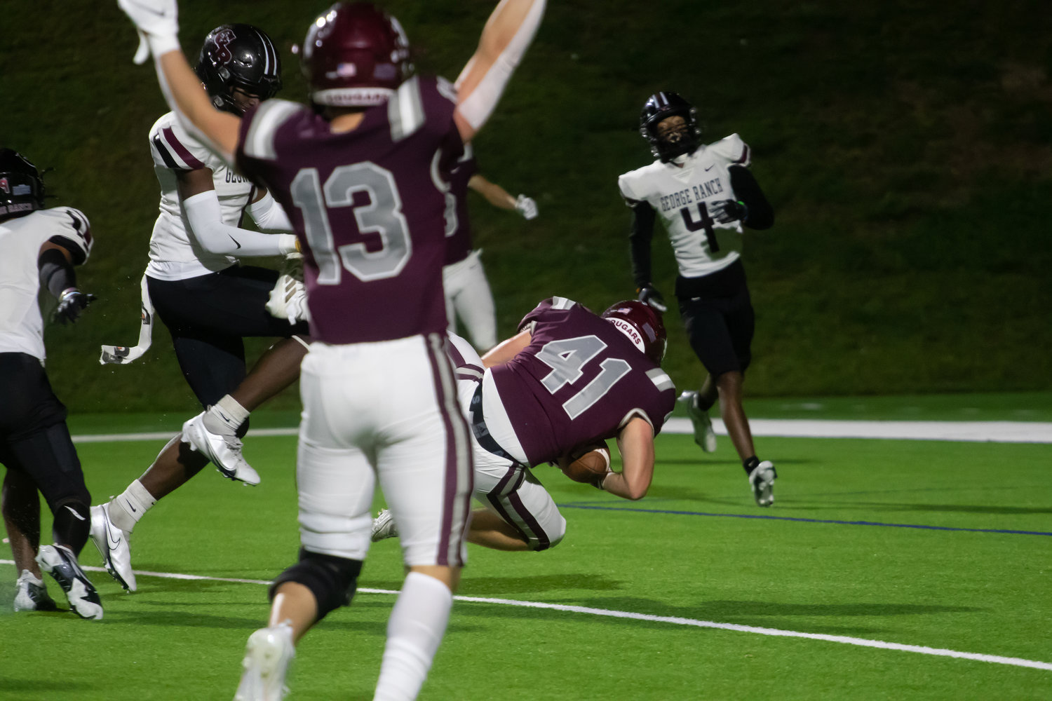 Colten Michalec scores a touchdown during Friday's game between Cinco Ranch and George Ranch at Rhodes Stadium.