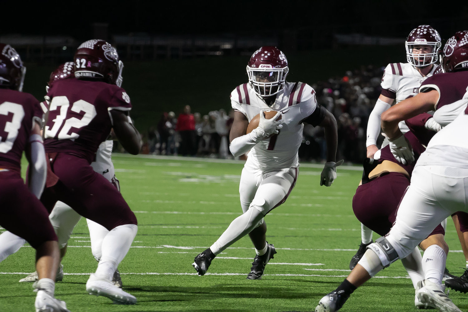 Sam McKnight tries to find a hole to run through during Friday's Class 6A-Division I area round game between Cinco Ranch and Cy-Fair at Pridgeon Stadium.
