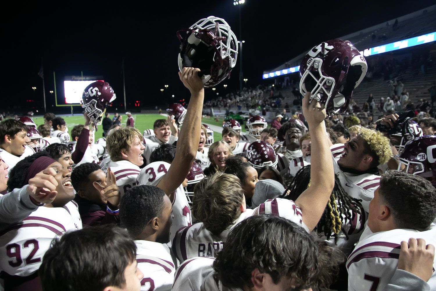 Cinco Ranch celebrates after winning Friday's Class 6A-Division I area round game between Cinco Ranch and Cy-Fair at Pridgeon Stadium.