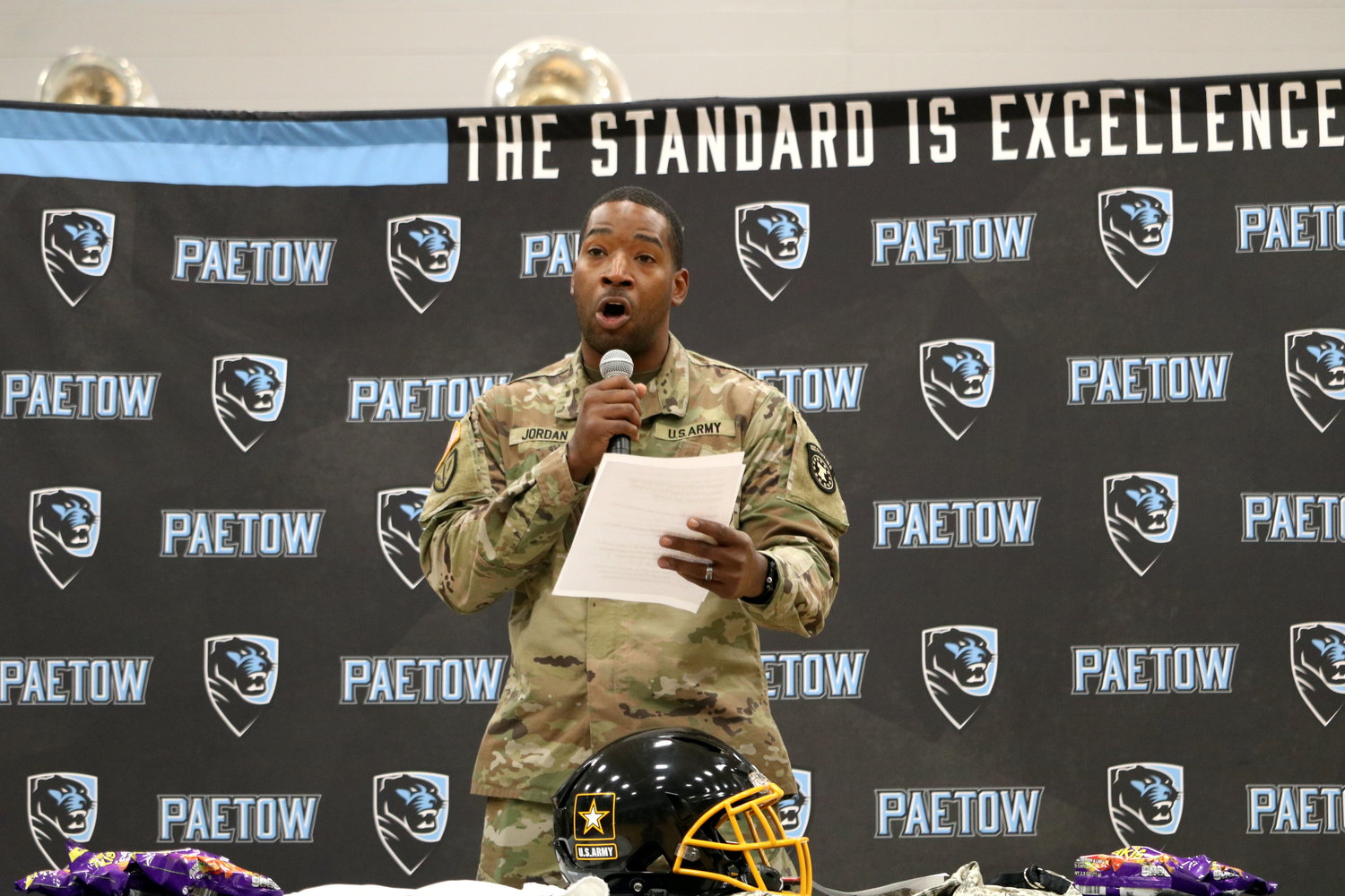 Staff Sargent Jordan of the U.S. Army talks during Friday’s pep rally at Paetow.