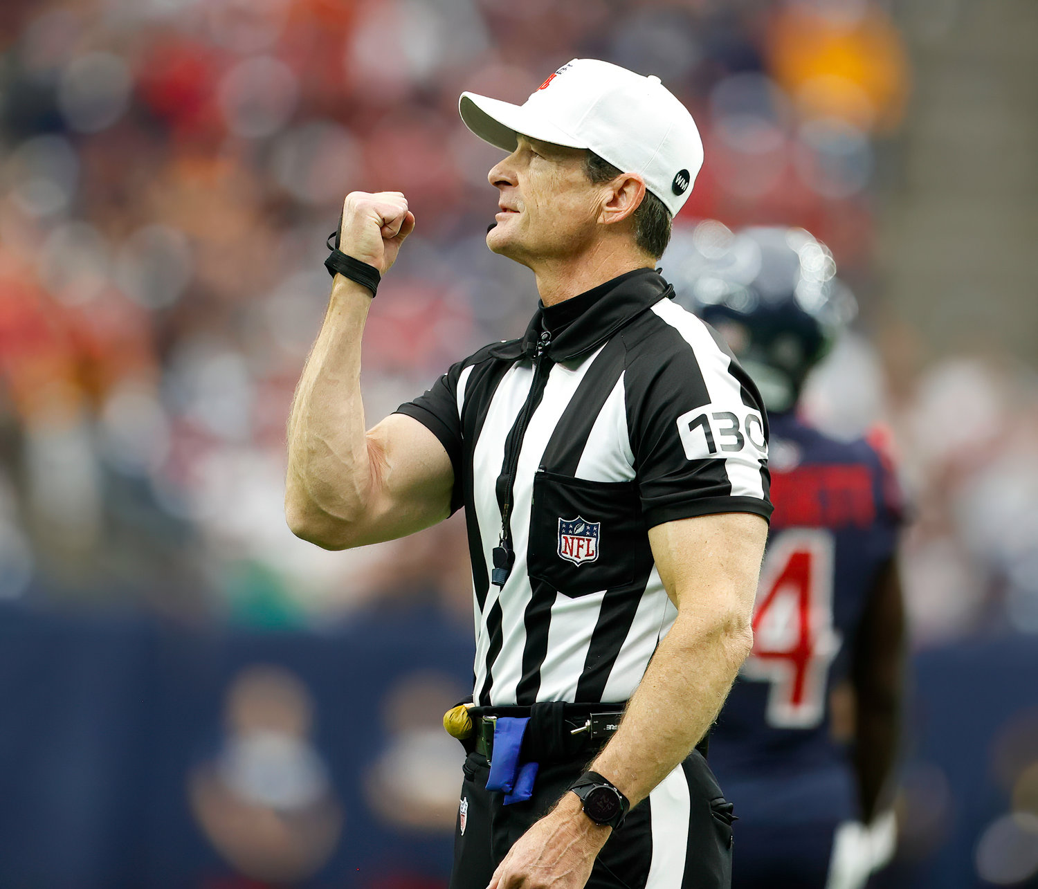 Referee Land Clark (130) signals for a facemask penalty against the Houston Texans during an NFL game between the Texans and the Cleveland Browns on Dec. 4, 2022, in Houston. The Browns won, 27-14.