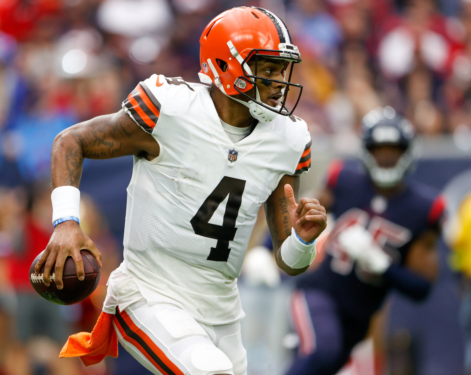Cleveland Browns quarterback Deshaun Watson (4) scrambles out of the backfield during an NFL game between the Houston Texans and the Cleveland Browns on Dec. 4, 2022, in Houston. The Browns won, 27-14.