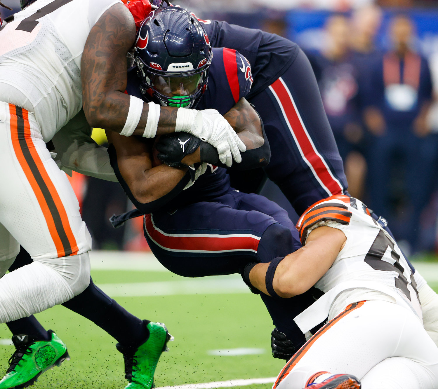 Houston Texans running back Dameon Pierce (31) is tackled on a carry during an NFL game between the Houston Texans and the Cleveland Browns on Dec. 4, 2022, in Houston. The Browns won, 27-14.