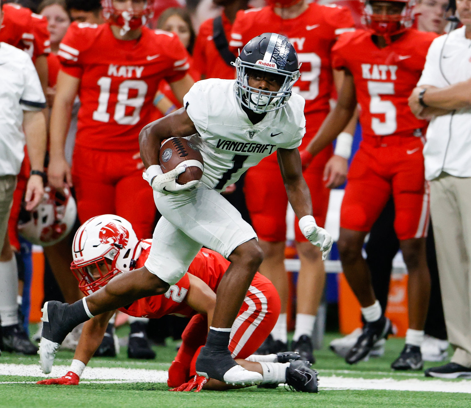 Vandegrift Vipers junior wide receiver Miles Coleman (1) carries the ball after a catch during the Class 6A-DII state semifinal football game between Katy and Vandegrift on Dec. 10, 2022 in San Antonio.