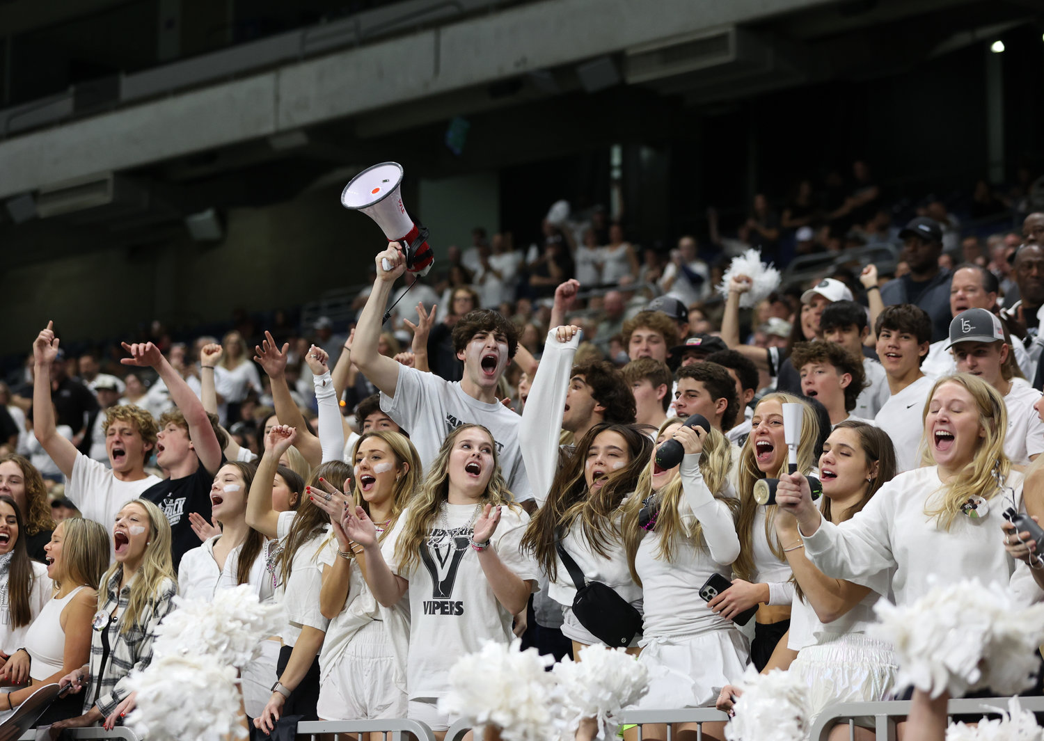 The Vandegrift student section cheers during the Class 6A-DII state semifinal football game between Katy and Vandegrift on Dec. 10, 2022 in San Antonio.