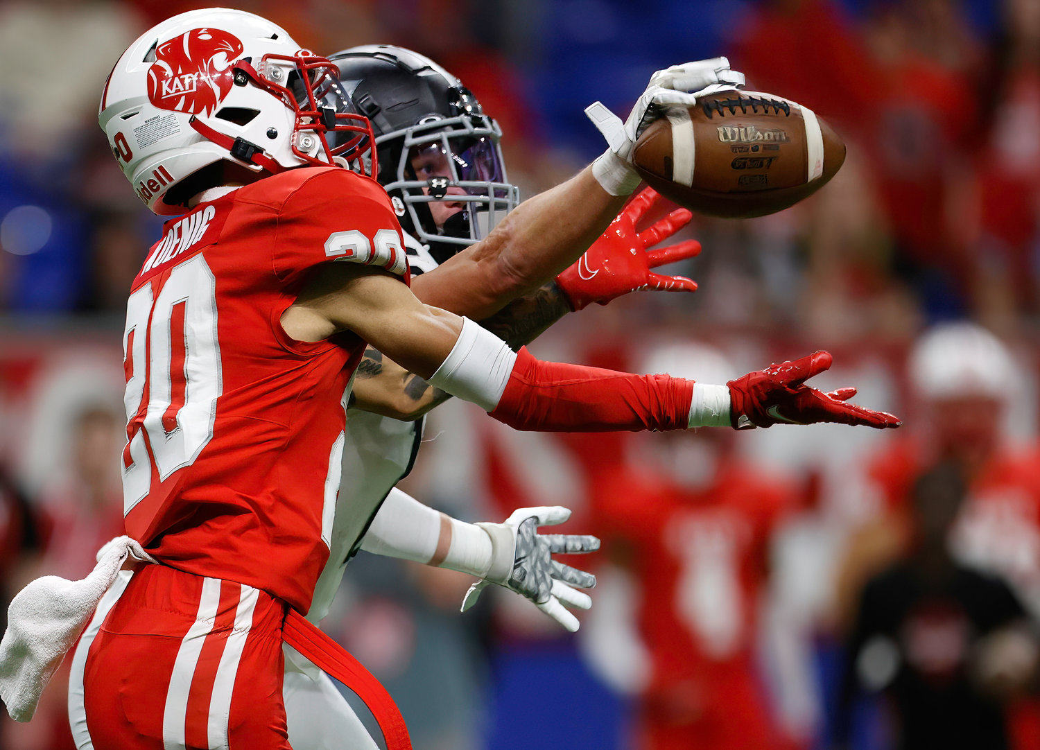 Vandegrift Vipers senior defensive back Isaiah Thompson (15) knocks down a pass intended for Katy wide receiver Micah Koenig (20) during the Class 6A-DII state semifinal football game between Katy and Vandegrift on Dec. 10, 2022 in San Antonio.