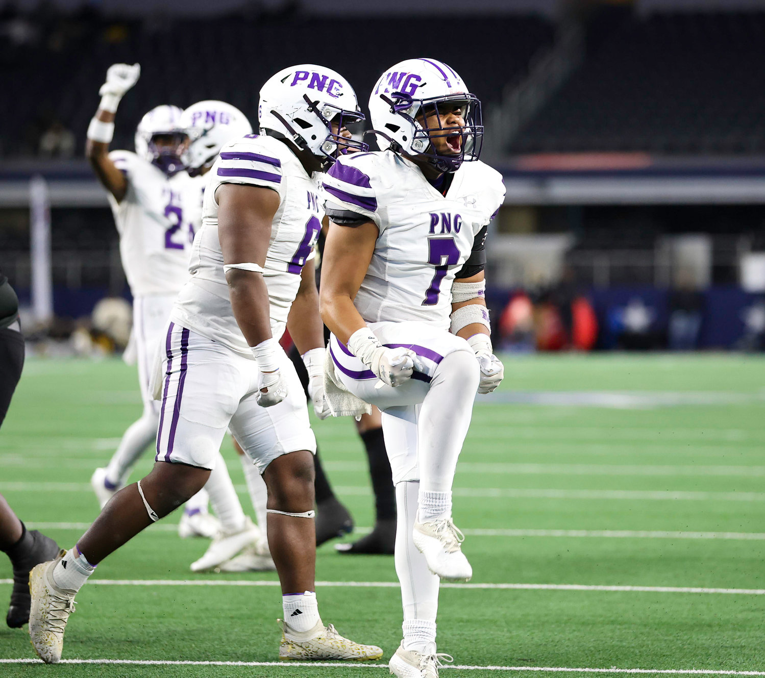 Port Neches-Groves linebacker Sean Gardiner (7) celebrates a defensive stop during the Class 5A Division II football state championship game between South Oak Cliff and Port Neches-Groves in Arlington, Texas, on Dec. 16, 2022.