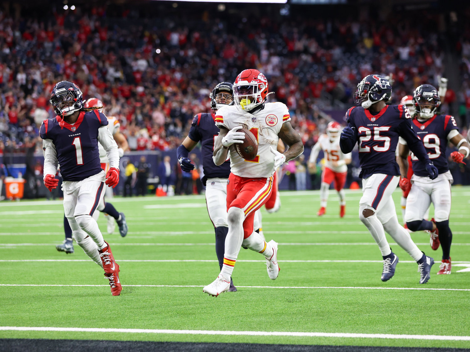 Kansas City Chiefs running back Jerick McKinnon (1) scores the game-winning touchdown in overtime on a 26-yard carry during an NFL game between the Texans and the Chiefs on Dec. 18, 2022, in Houston.