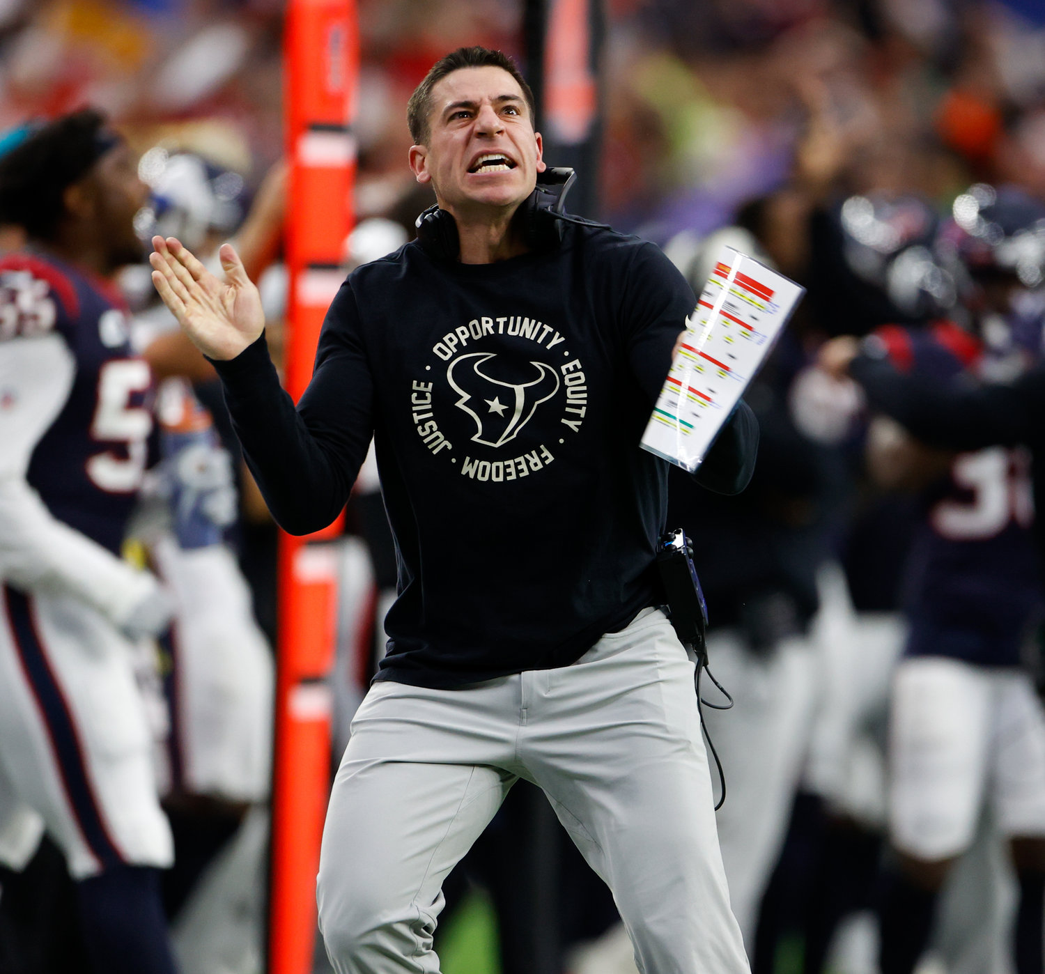 Houston Texans special teams coordinator Frank Ross celebrates after the Kansas City Chiefs missed a potential game-winning field goal near the end of regulation in an NFL game between the Texans and the Chiefs on Dec. 18, 2022, in Houston. The Chiefs won, 30-24, in overtime.