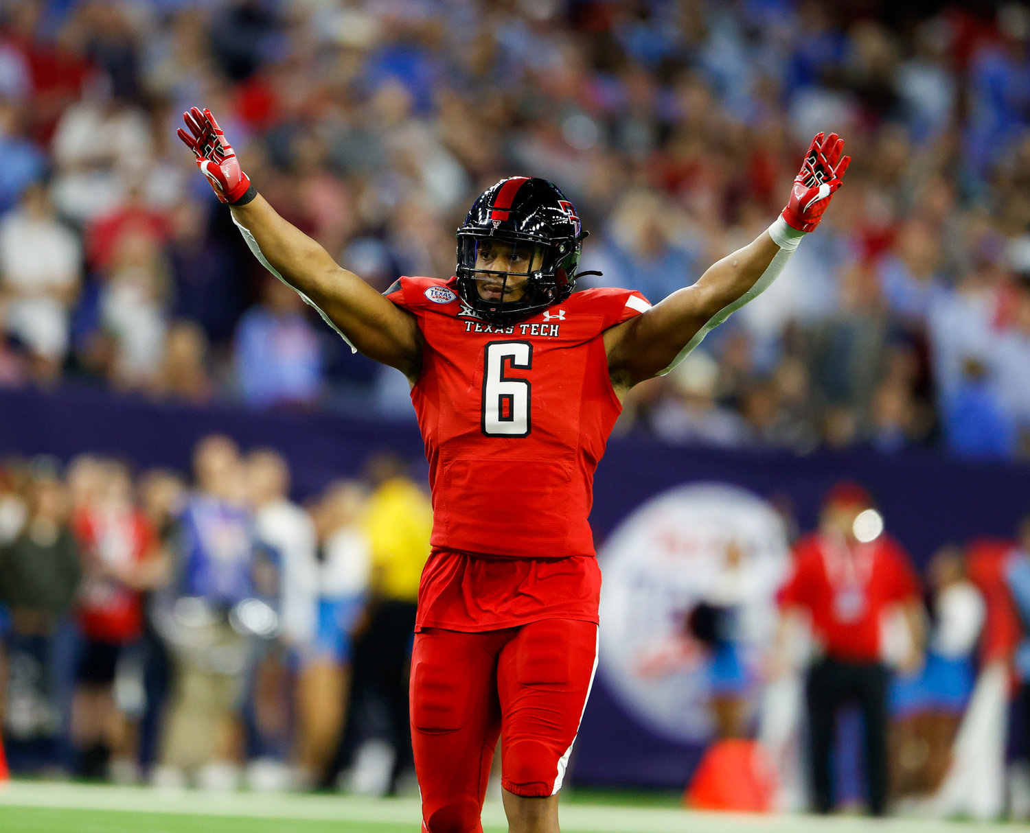 Texas Tech linebacker Kosi Eldridge (6) gestures after a defensive stop on fourth down during the TaxAct Texas Bowl on Dec. 28, 2022 in Houston.
