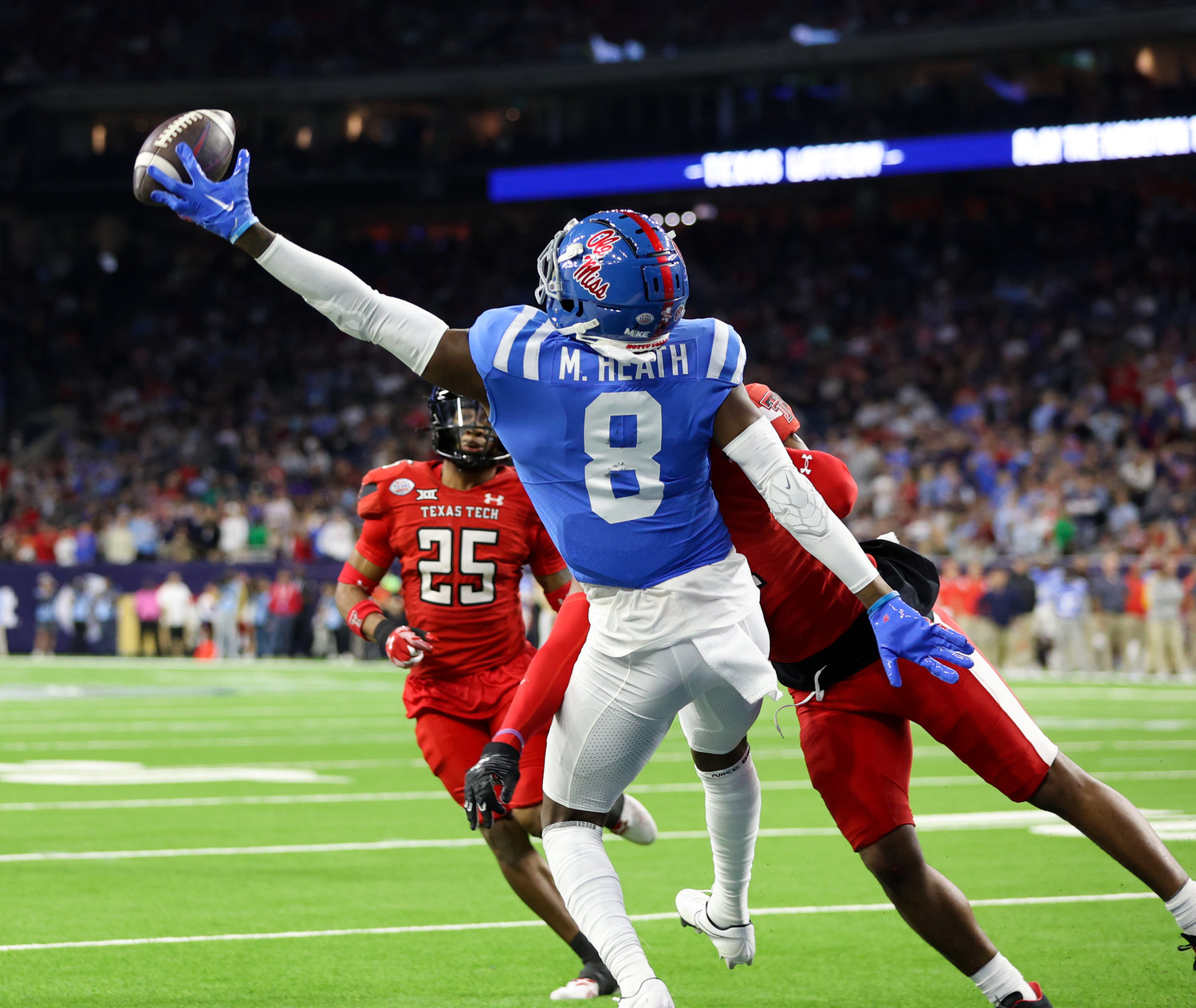 Mississippi wide receiver Malik Heath (8) just misses a would-be touchdown pass in the end zone during the TaxAct Texas Bowl on Dec. 28, 2022 in Houston.