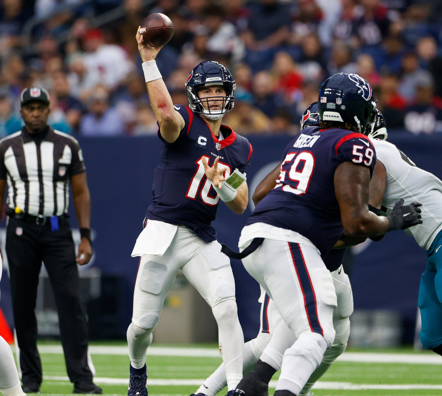 Texans quarterback Davis Mills (10) passes the ball during an NFL game between the Houston Texans and the Jacksonville Jaguars on Jan. 1, 2023 in Houston. The Jaguars won, 31-3.