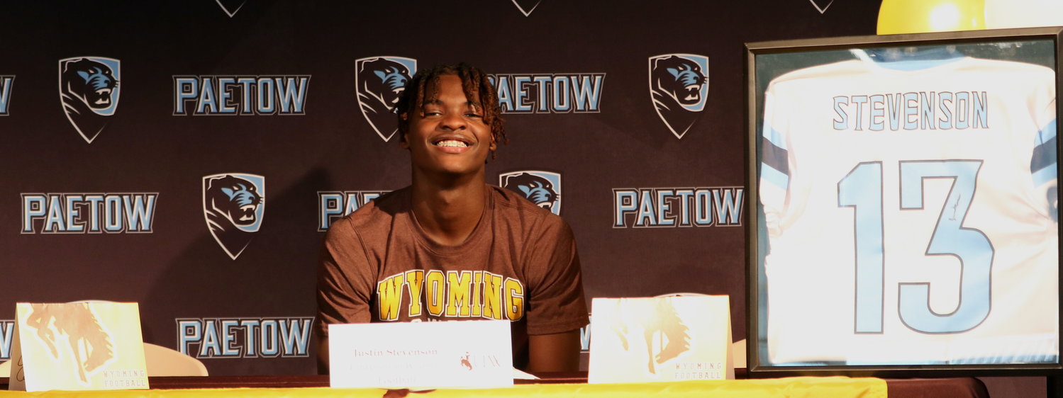 Justin Stevenson signs his national letter of intent to play at Wyoming.