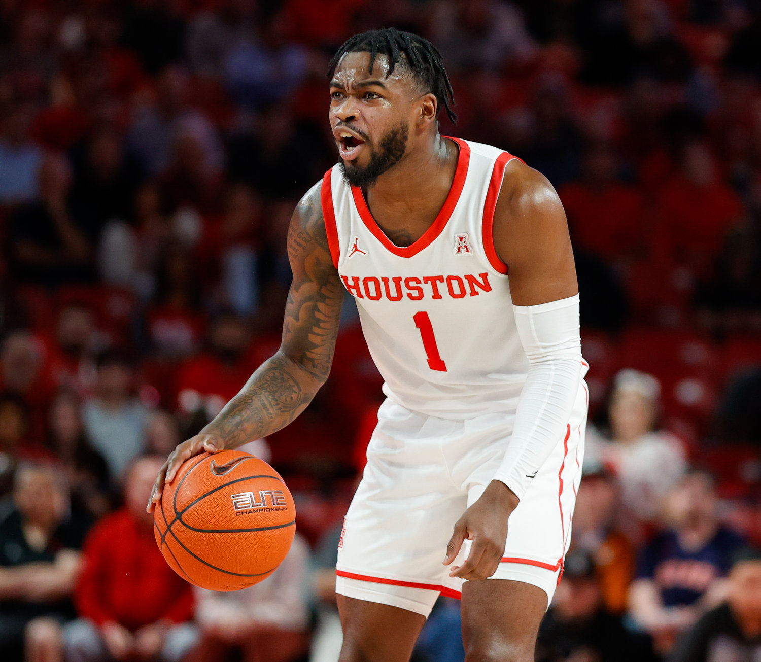 Houston guard Jamal Shead (1) calls out to his teammates during an NCAA men’s basketball game between the Houston Cougars and the Southern Methodist Mustangs on Jan. 5, 2023 in Houston. Houston won, 87-53,