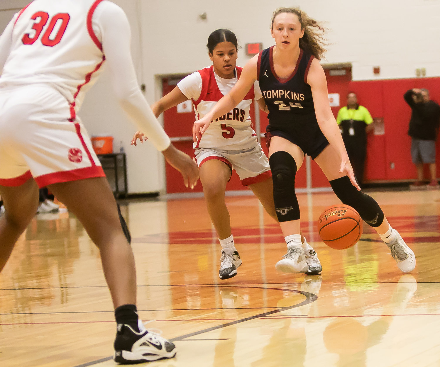 Gabby Panter gets past the Katy defense during Tuesday's game between Katy and Tompkins at the Katy gym.