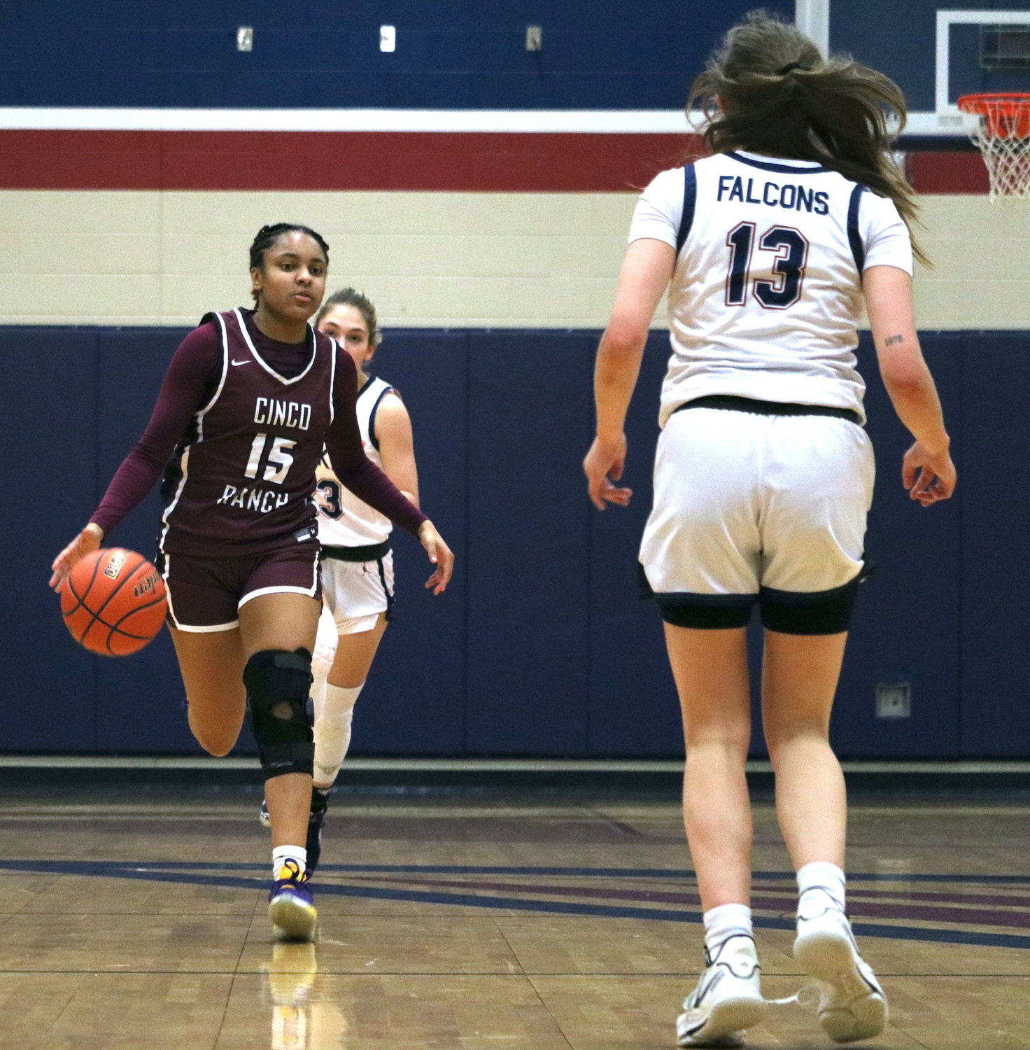 Danielle Williams dribbles up court during Friday’s game between Tompkins and Cinco Ranch at the Tompkins gym.