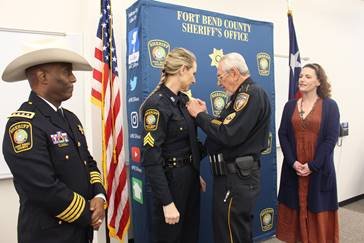 Deputy Kathryn Petrash, second from left, was promoted to sergeant. She is a graduate of the FBCSO Gus George Law Enforcement Academy and was 2019 class president. She has served within many divisions of the sheriff’s office including dispatch, support services, and detention. She was also a member of the honor guard. Petrash was pinned by her father, Harris County Sheriff's office reserve Sgt. Dan Petrash.