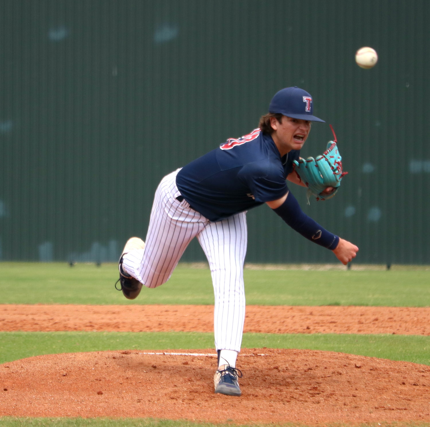 Gavin Brewer pitches during a game between Tompkins and Cinco Ranch at the Cinco Ranch baseball field.