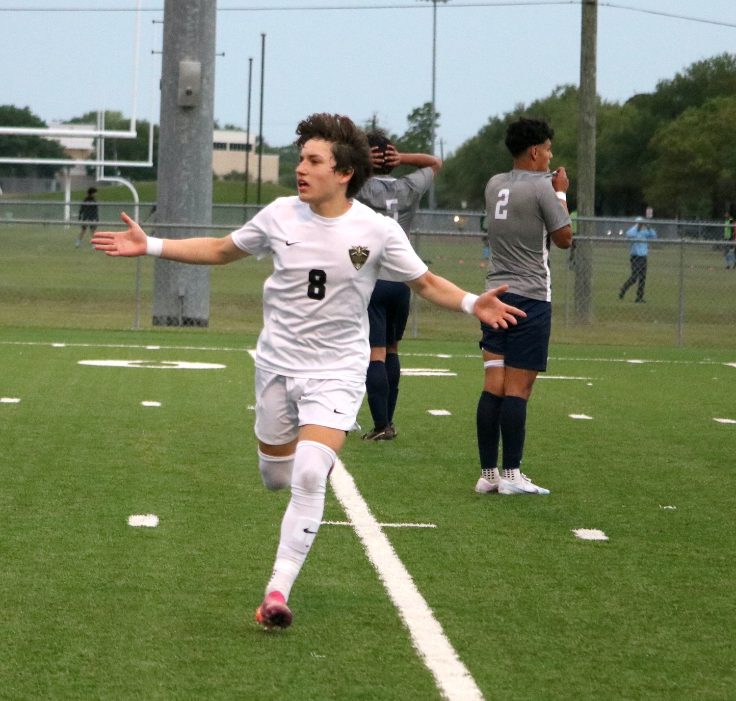 Marcelo Ojeda celebrates after scoring the game winning goal during Tuesday's match between Jordan and Cy-Ridge at the Spring Woods football field.