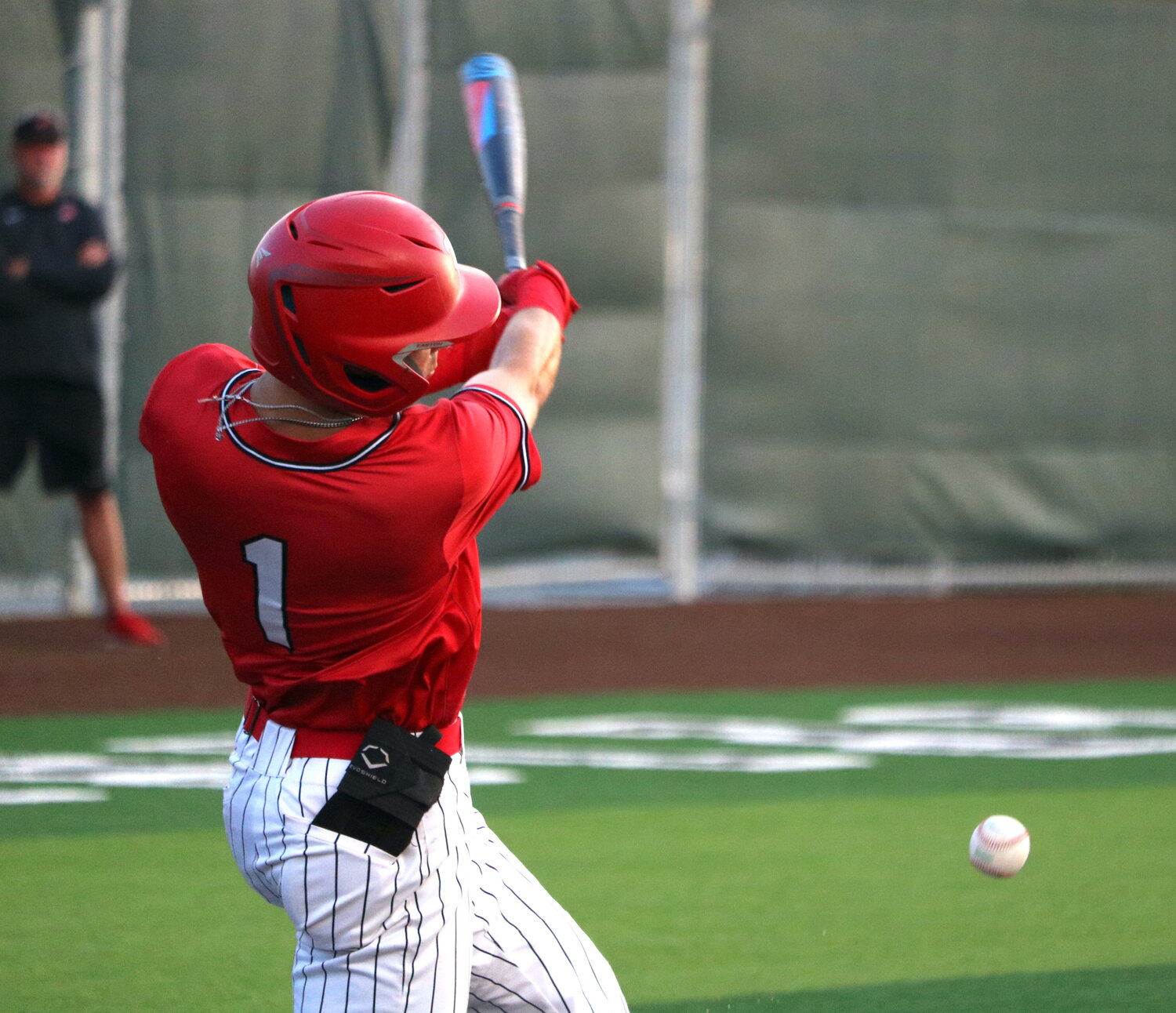 Graham Laxton hits during Friday's area round game between Katy and Cy-Fair at Langham Creek.