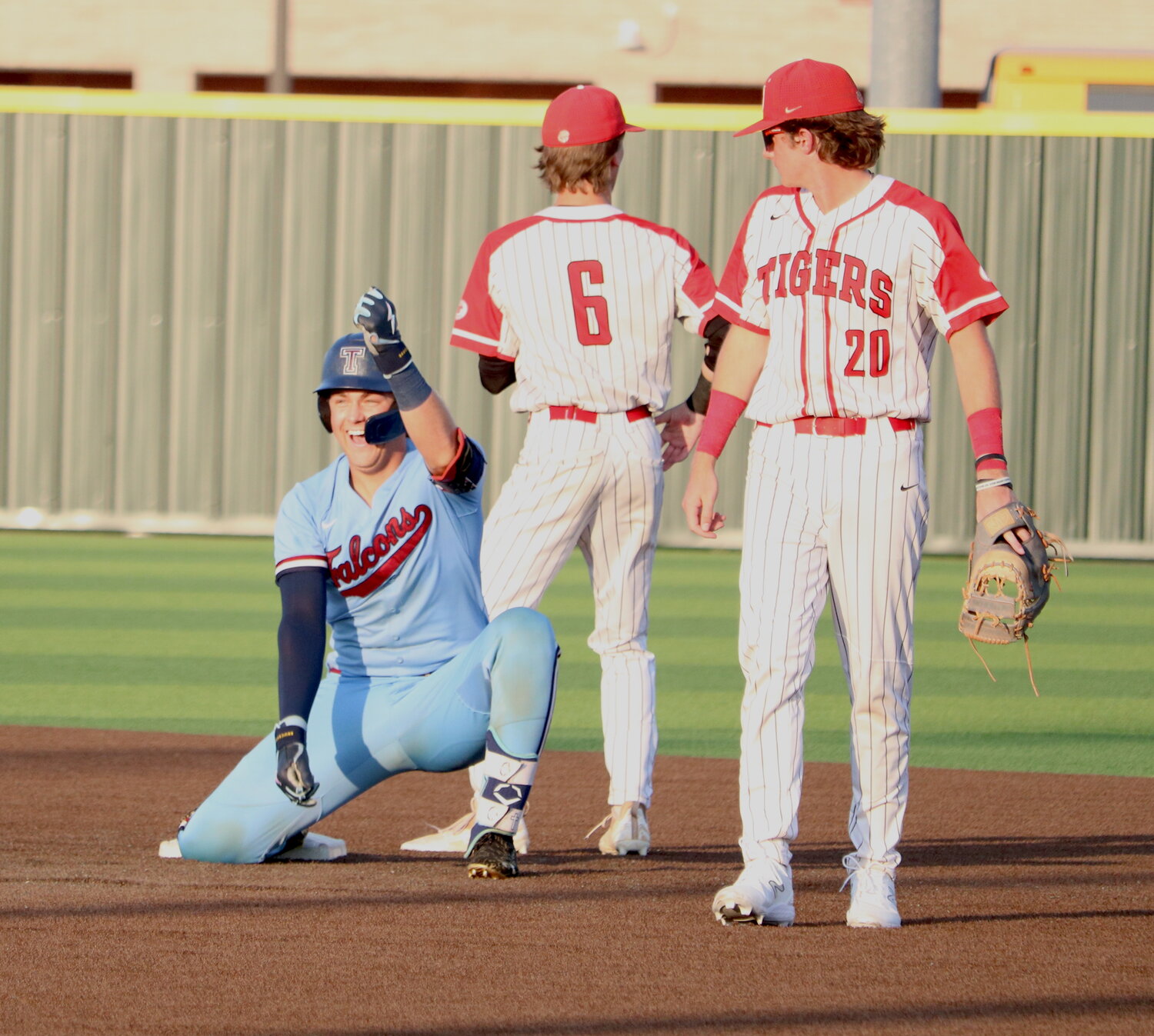 Landon West celebrates after hitting a two-run double during Thursday's Regional Quarterfinal game between Katy and Tompkins at Cy-Springs.