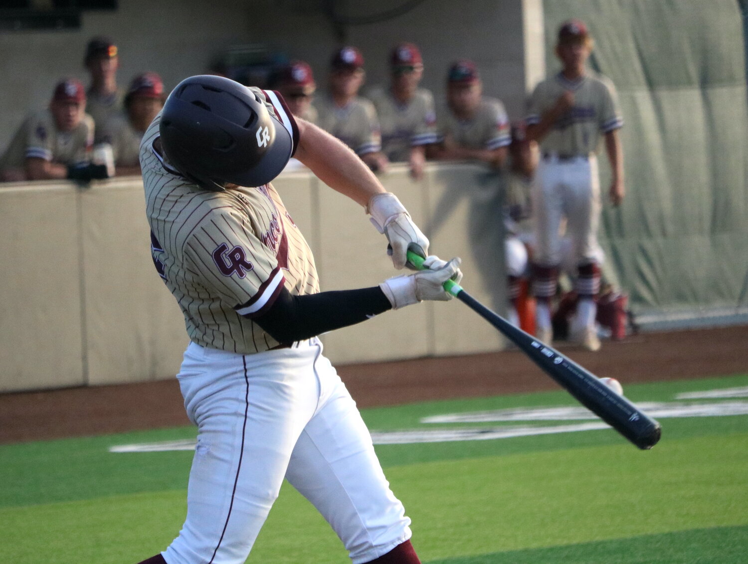 Gavin Rutherford hits during Friday's Regional Quarterfinal between Cinco Ranch and Ridge Point at Langham Creek.