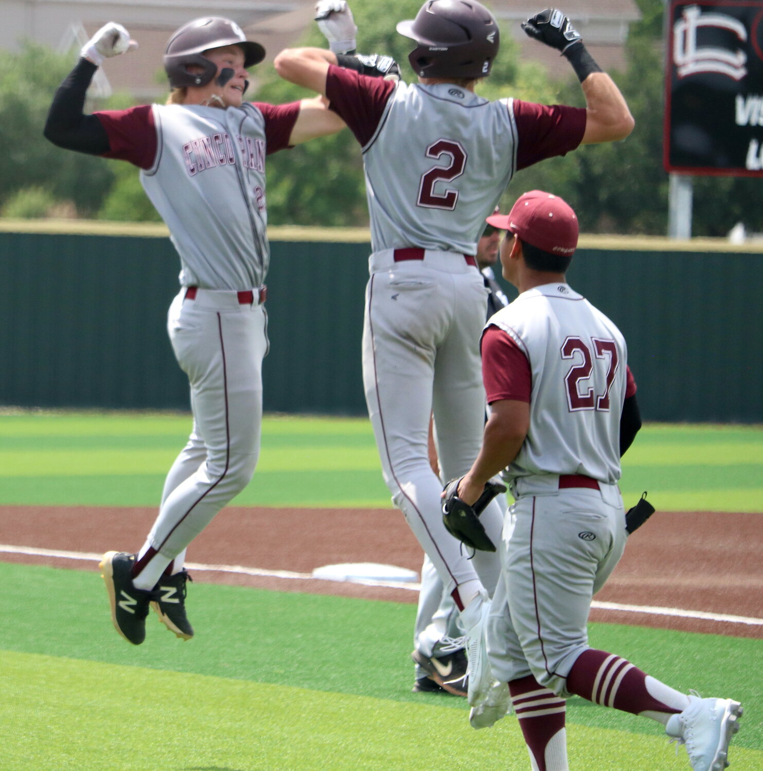 Lucas Franco and Logan Sosolik celebrate after a Franco home run during Saturday's Regional Quarterfinal between Cinco Ranch and Ridge Point.