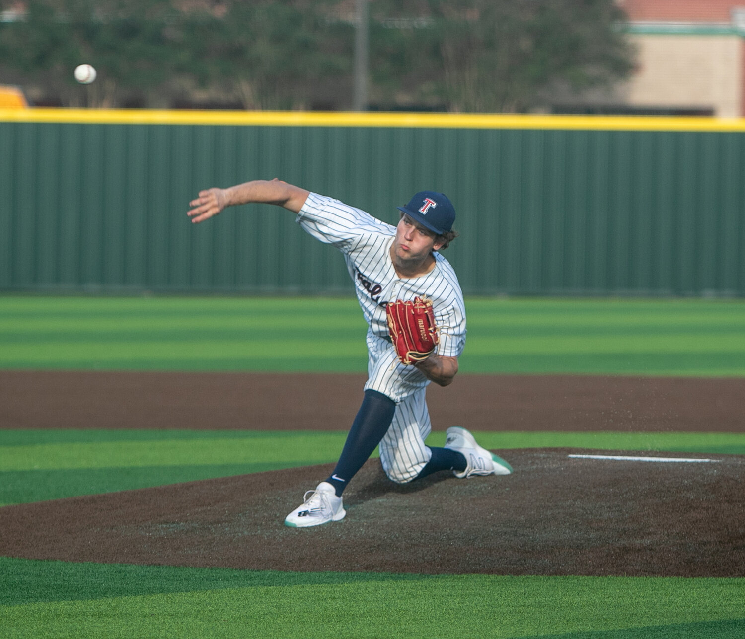 Hudson Maelerts pitches during Saturday's Regional Quarterfinal between Katy and Tompkins at Cy-Springs.