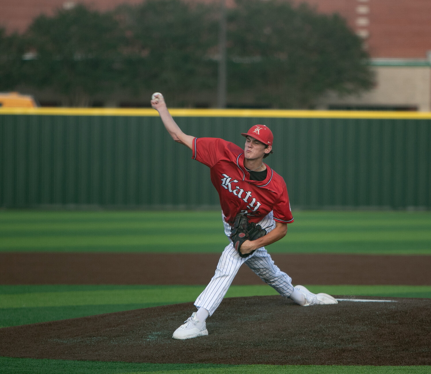 Cade Nelson pitches during Saturday's Regional Quarterfinal between Katy and Tompkins at Cy-Springs.