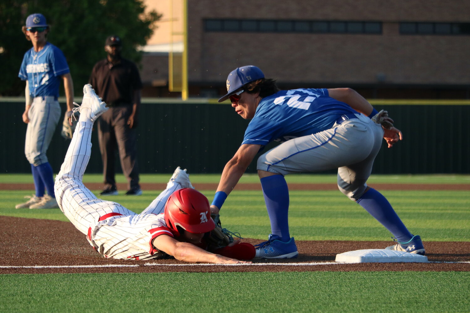 Jacob Hilton tries to slide into third base during during Thursday's Regional Semifinal between Katy and Clear Springs at Langham Creek.