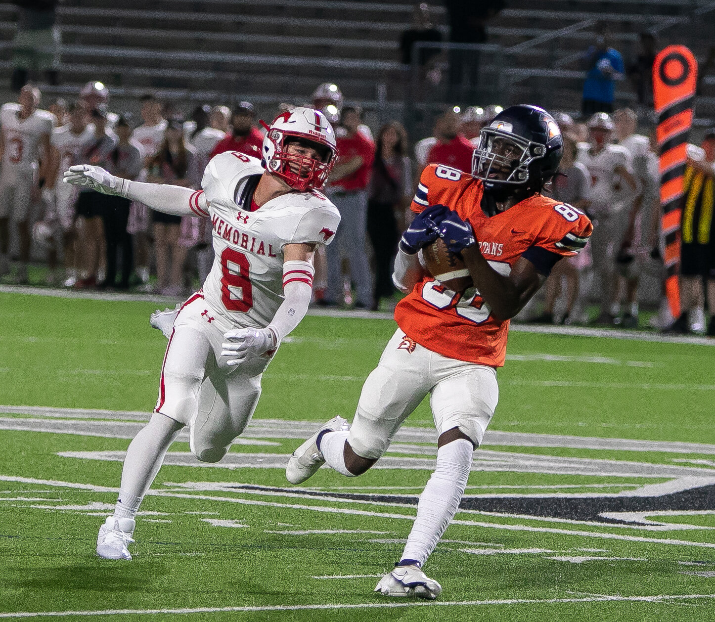 Ryan Fowler brings in a catch during Thursday's game between Seven Lakes and Memorial at Legacy Stadium.