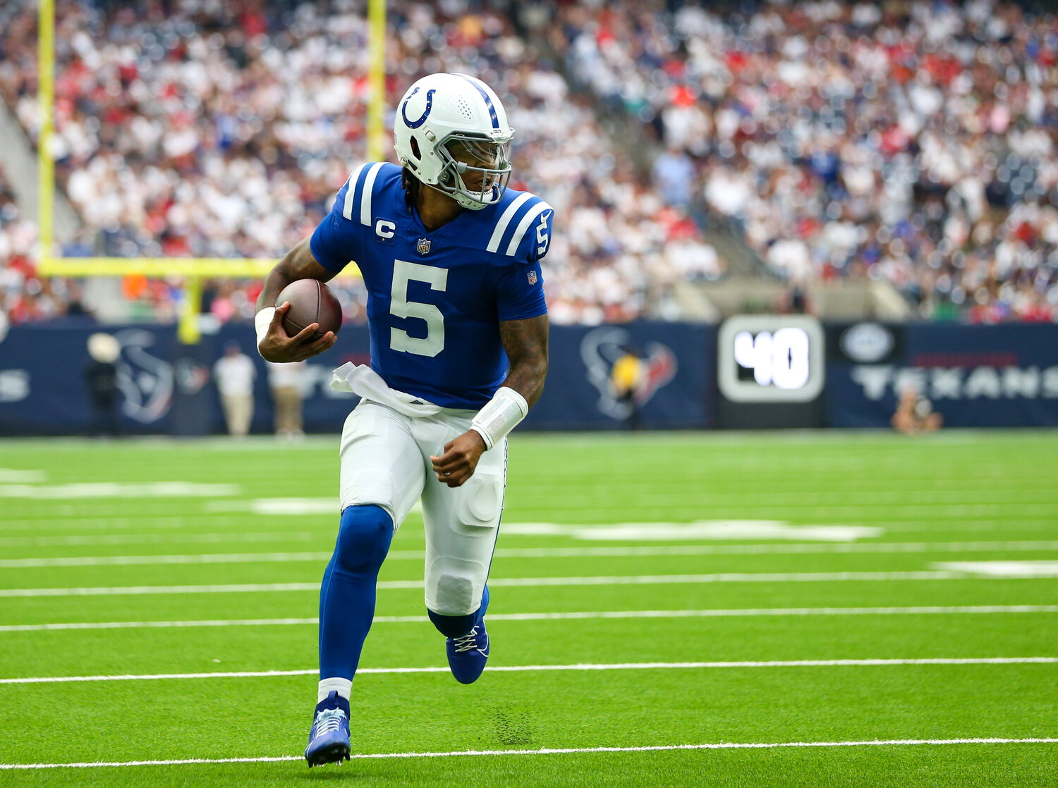 Colts quarterback Anthony Richardson (5) scores on a 15-yard touchdown run during an NFL game between the Texans and the Colts on September 17, 2023 in Houston. The Colts won, 31-20.