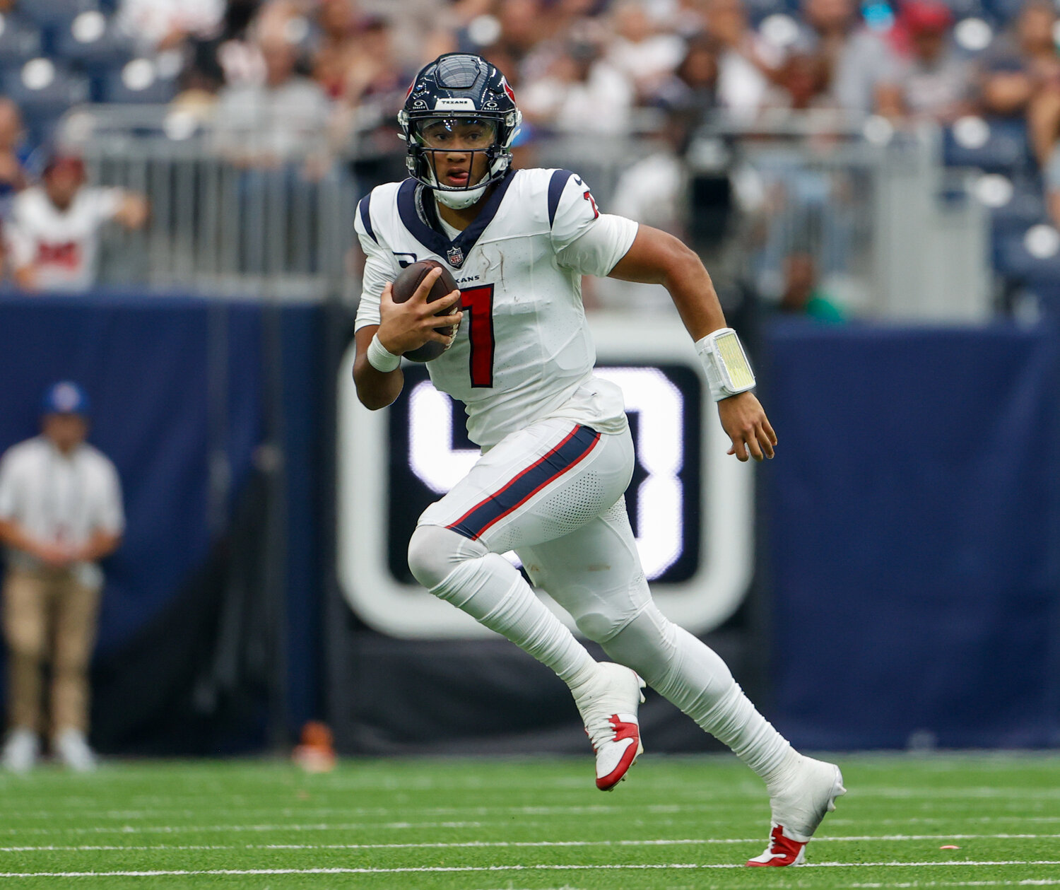 Texans quarterback C.J. Stroud (7) scrambles to escape pressure during an NFL game between the Texans and the Colts on September 17, 2023 in Houston. The Colts won, 31-20.