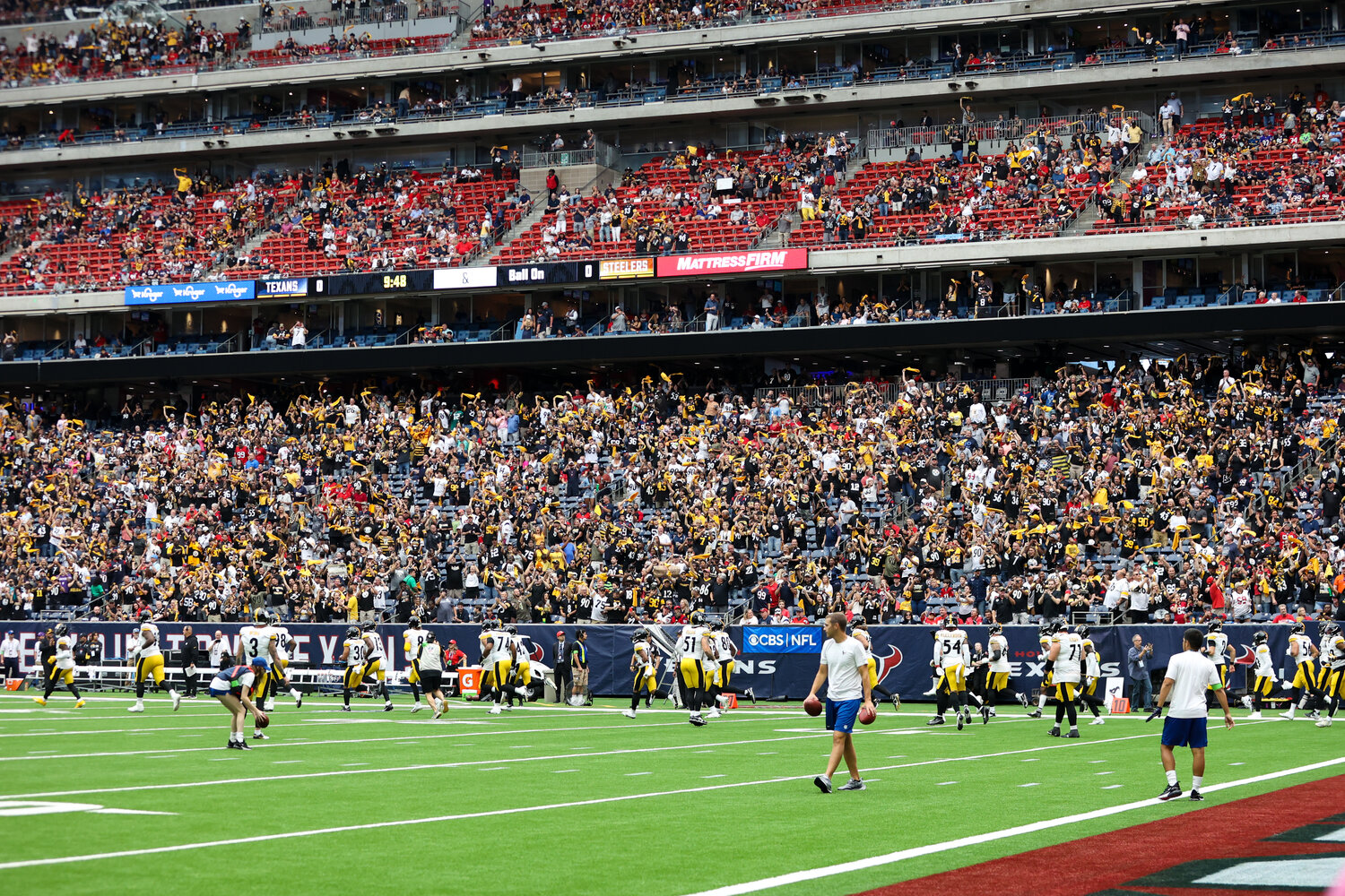 A large crowd of Pittsburgh fans greets the Steelers as they take the field for an NFL game between the Texans and the Steelers on October 1, 2023 in Houston.