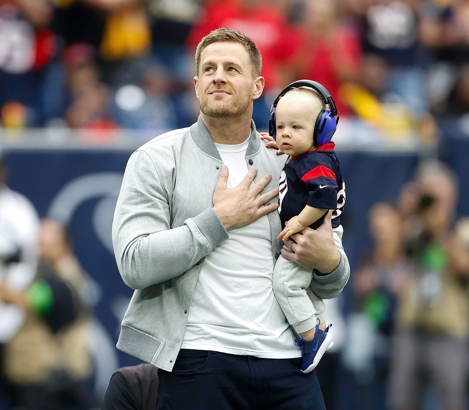 Former Houston Texans player JJ Watt greets the crowd before the start of an NFL game between the Texans and the Steelers on October 1, 2023 in Houston. Watt was induced into the Texans’ Ring of Honor at halftime.