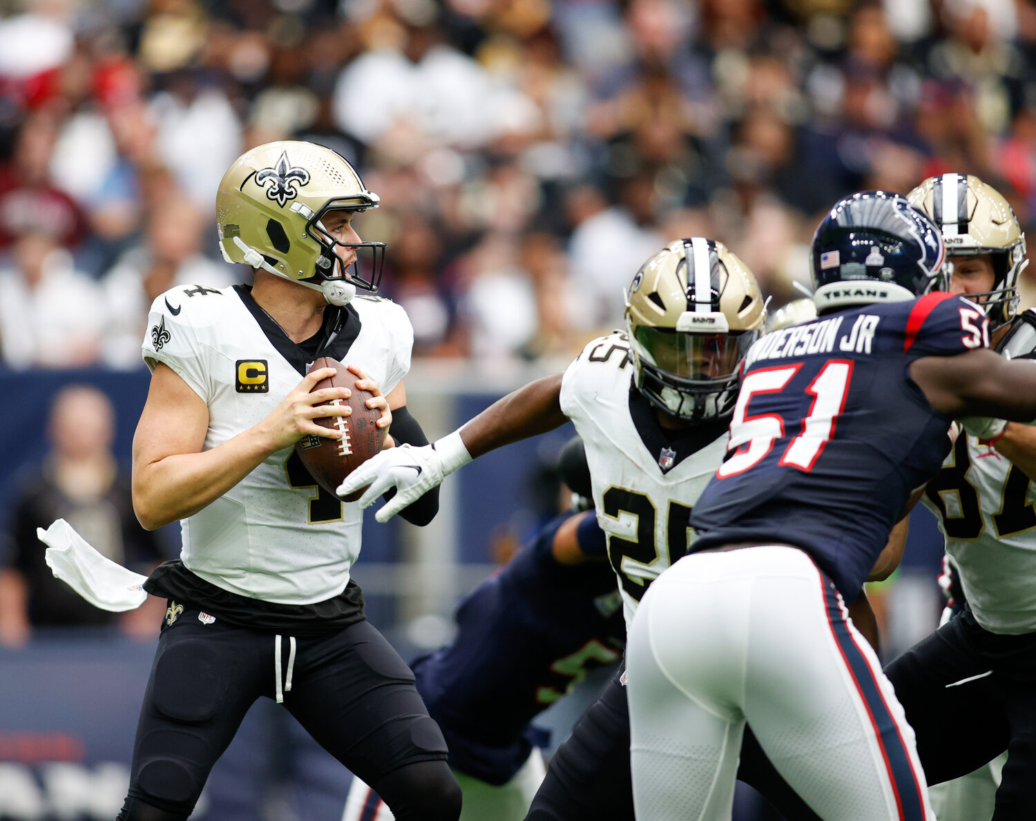 Saints quarterback Derek Carr (4) looks to pass during an NFL game between the Texans and the Saints on October 15, 2023 in Houston. The Texans won, 20-13.