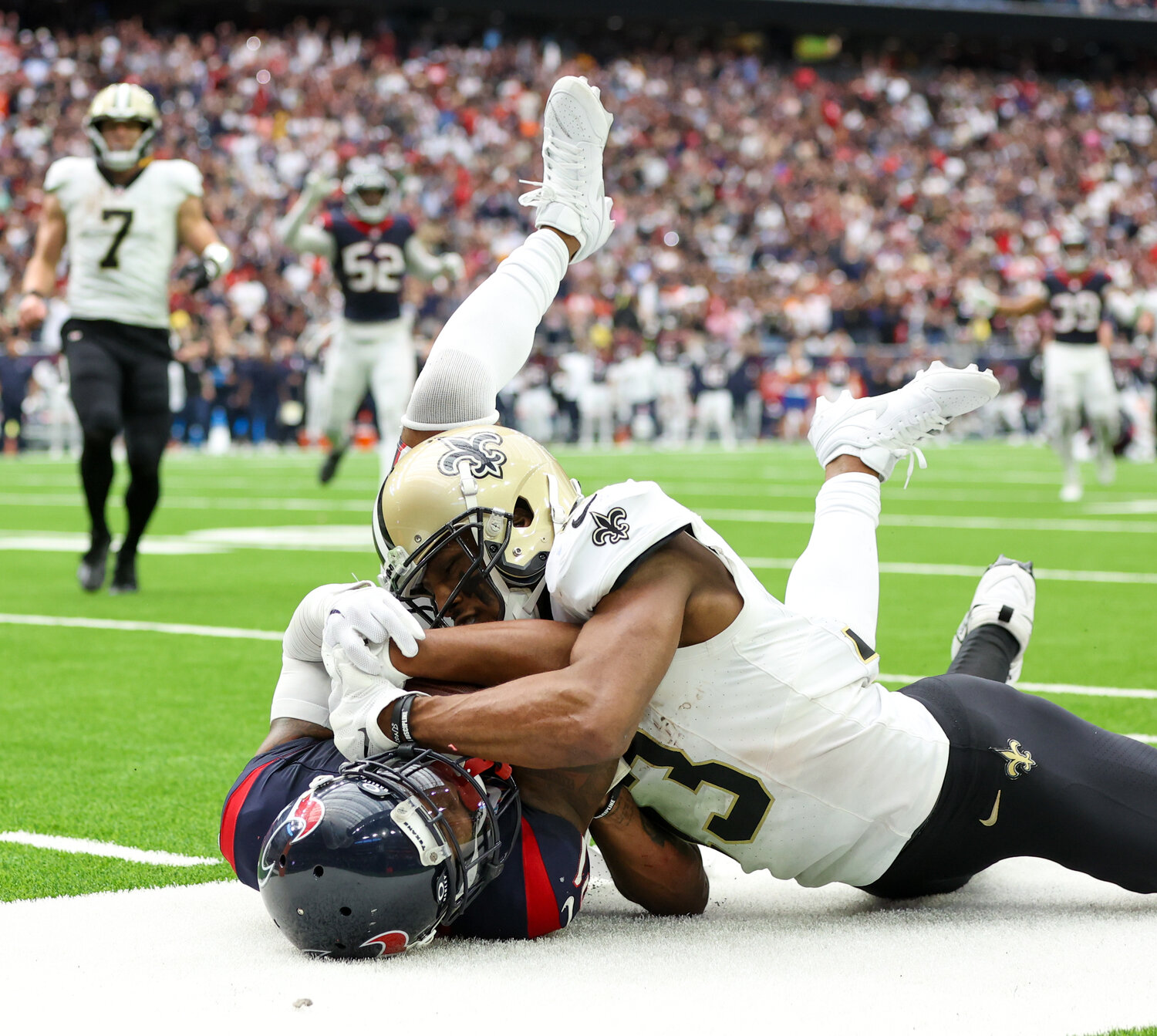 Texans wide receiver Robert Woods (2) makes an interception to end the Saints’ final drive in the fourth quarter and seal a 20-13 victory for the Texans during an NFL game on October 15, 2023 in Houston.